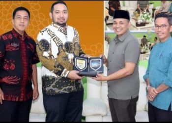 Waka DPRD Provinsi Jambi dari Fraksi Golkar saat Bertukar Cinderamata dengan Dinsosdukcapil NTB. (Foto Dok. Humas)