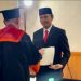 Ketua DPRD Provinsi Jambi, Edi Purwanto saat Usai Menjalankan Sidang Promosi Doktor di Unja (06/09). Foto/Ist