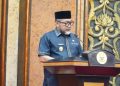 Pjs. Gubernur Jambi, Sudirman SH MH Menyampaikan Sambutan dalam Rapat Paripurna di DPRD Provinsi Jambi, Selasa Malam (12/11). /Dok/Ist